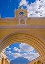 Ciudad de Guatemala, Guatemala, April, 25, 2018: The famous arch of the city center of Antigua together with agua Royalty Free Stock Photo