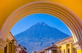 Ciudad de Guatemala, Guatemala, April, 25, 2018: View of the active Agua volcano in the background through a colorful Royalty Free Stock Photo