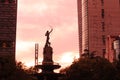 Ciudad de MÃÂ©xico, mexico; 15/01/2020: fuente de la diana cazadora, hunter statue between two buildings on a cloudy sky afternoon.