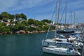 Ciutadella white yachts in the port with befautiful villas, Menorca