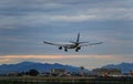 The civil airliner landing in the sunset comes from Beijing Capital International Airport