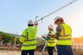 Civil engineer inspects work using radio communication with the management team in the construction area Royalty Free Stock Photo