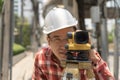 Civil engineer land survey with tacheometer or theodolite equipment..worker Checking construction site on Royalty Free Stock Photo