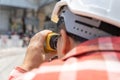 Civil engineer land survey with tacheometer or theodolite equipment. Worker Checking construction site on the road. Surveyor Royalty Free Stock Photo