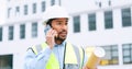 Civil engineer on a phone call while at a construction site discussing a strategy and plan to work on. Close up portrait Royalty Free Stock Photo