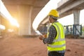 A civil engineer or supervise inspected the structure road at new road construction