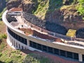 Civil engineering project showing rock shed construction using large quantities of vehicle tyres to form a cushion layer Royalty Free Stock Photo