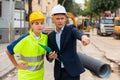 Civil engineers checking work process in construction site Royalty Free Stock Photo