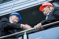Civil engineers shaking hands Royalty Free Stock Photo