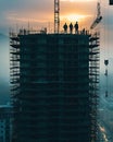 Civil engineers supervising the construction of the building