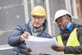 Civil engineers working on construction site