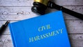 Civil harassment and gavel on a table. Law concept Royalty Free Stock Photo