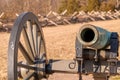 A civil war era cannon in front of a wooden worm fencing at Gettysburg National Military Park Royalty Free Stock Photo