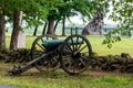 A Civil War era cannon is placed behind a stone wall in Gettysburg, PA - image Royalty Free Stock Photo