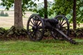 A Civil War era cannon is placed behind a stone wall in Gettysburg, PA - image Royalty Free Stock Photo