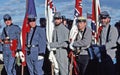 Civil War reenactors portraying Confederate soldiers.