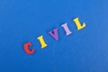 CIVIL word on blue background composed from colorful abc alphabet block wooden letters, copy space for ad text. Learning english Royalty Free Stock Photo