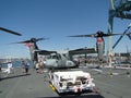 Civilians inspect an MV-22 Osprey