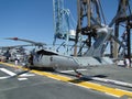 Civilians inspect an SH-60 Seahawk