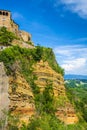 Civita di Bagnoregio, Italy - Volcanic tuff slopes of historic town of Civita di Bagnoregio with panoramic view of hills and