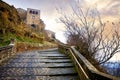 Civita di Bagnoregio: picturesque landscape of the ancient village at sunset, after a thunderstorm, on the steep tuff hill. Italy Royalty Free Stock Photo