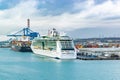 Royal Caribbean Cruise Line Jewel of The Seas Cruise Ship and MSC Maureen Cargo Ship docked in the Port of Civitavecchia, Rome. Royalty Free Stock Photo