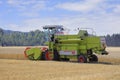 Claas Dominator 48S Combine Harvester in Wheat Field Royalty Free Stock Photo