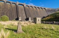 The Claerwen reservoir. Sunny morning. Trig point in foreground Royalty Free Stock Photo