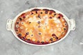 Clafoutis cherry pie - traditional french dessert in a white baking dish Royalty Free Stock Photo