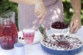 Clafoutis cherry pie.Women`s hands cut a homemade cake. Royalty Free Stock Photo