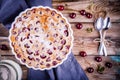 Clafoutis cherry pie on wooden background Royalty Free Stock Photo