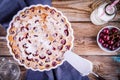 Clafoutis cherry pie on wooden background Royalty Free Stock Photo