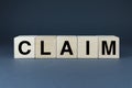 Claim. Cubes form the word Claim