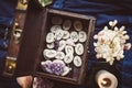 Clairvoyant tools rune stones, crystal pendulums in natural dark wooden case box. Royalty Free Stock Photo