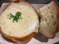 Delicious clam chowder in sourdough bread bowl