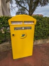 Yellow mailbox of the French public company La Poste