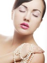 Clamor woman with pearl Royalty Free Stock Photo
