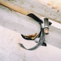 Clamp on white leaky water pipe Royalty Free Stock Photo