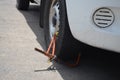 Clamped vehicle, wheel locked