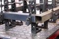 clamps fix the workpieces on slotted welding table Royalty Free Stock Photo