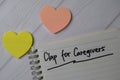 Clap For Caregivers write on a book isolated on office desk