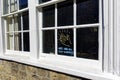 A Clap for NHS And All Key Workers fighting Coronavirus message written on a house window pane