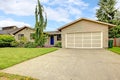 Clapboard siding house with garage