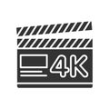 Clapper board black glyph icon. 4K ultra HD resolution movie shooting. Cinematograph concept. Pictogram for web page, mobile app, Royalty Free Stock Photo