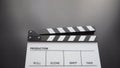 Clapper board or movie slate use in video production or movie and cinema industry. It`s white color on black background Royalty Free Stock Photo