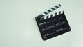 Clapper board or movie slate use in video production or movie and cinema industry. It`s black color on white background Royalty Free Stock Photo