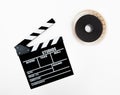 Clapper and 35mm reel isolated