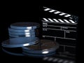 Clapperboard and cinema film roll