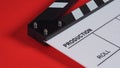 Clapperboard or movie slate on red background.it use in video production and film industry Royalty Free Stock Photo