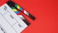 Clapperboard or movie slate on red background.it use in video production and film industry Royalty Free Stock Photo